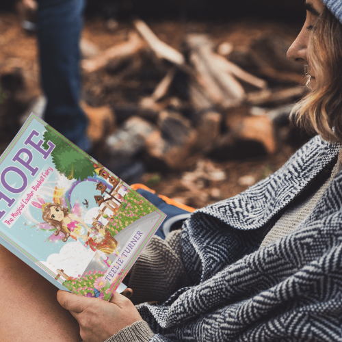 book-mockup-featuring-a-woman-reading-in-a-camping-site-30506-min