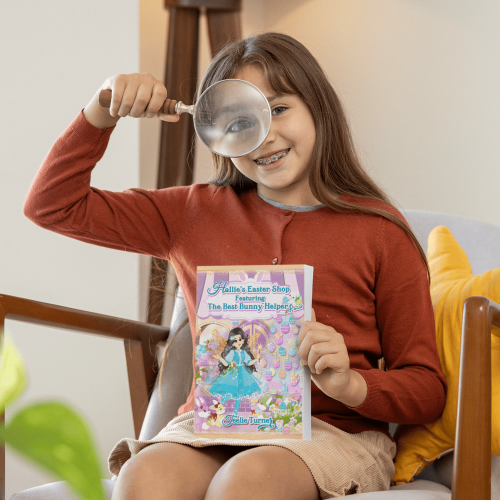 book-mockup-of-a-girl-playing-with-a-magnifying-glass-in-her-living-room-m26924 (1)-min