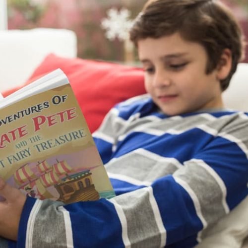 focused-boy-reading-pirate-pete