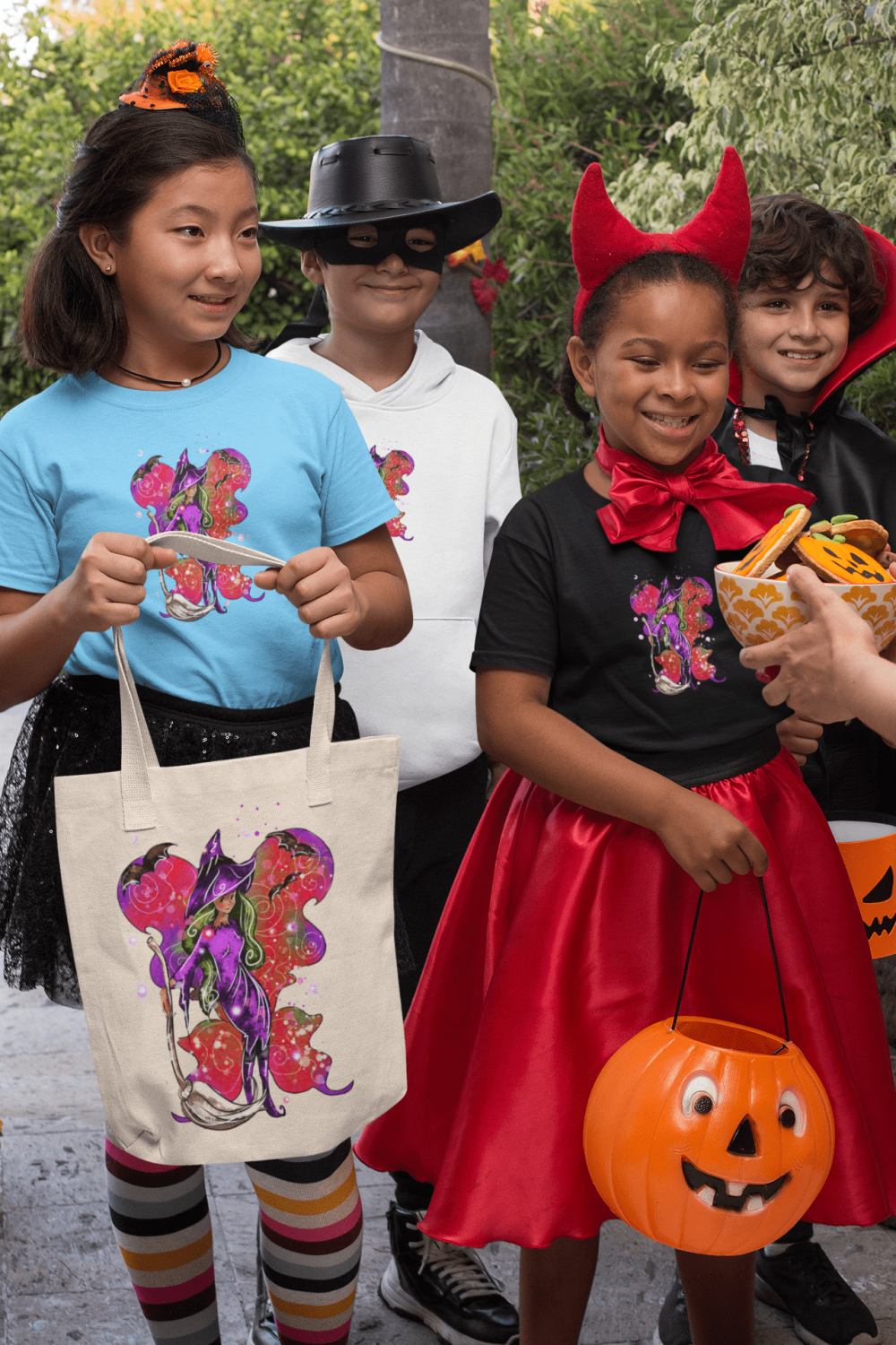 halloween-mockup-of-kids-with-t-shirts-and-tote-bags-asking-for-trick-or-treat-29323-min