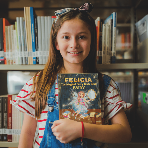 happy-little-girl-holding-a-book-mockup-at-the-library-a19273-min happy-little-girl-holding-a-book-mockup-at-the-library-a19273-min