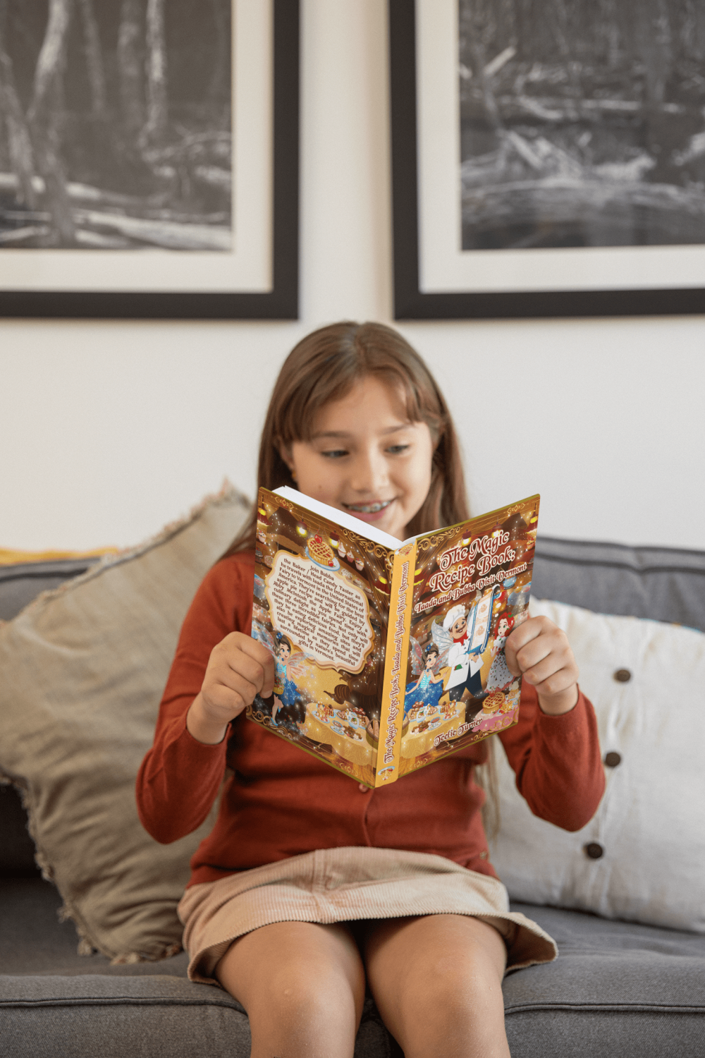 mockup-of-a-girl-holding-hard-cover-book-at-home-m26921-min (1)