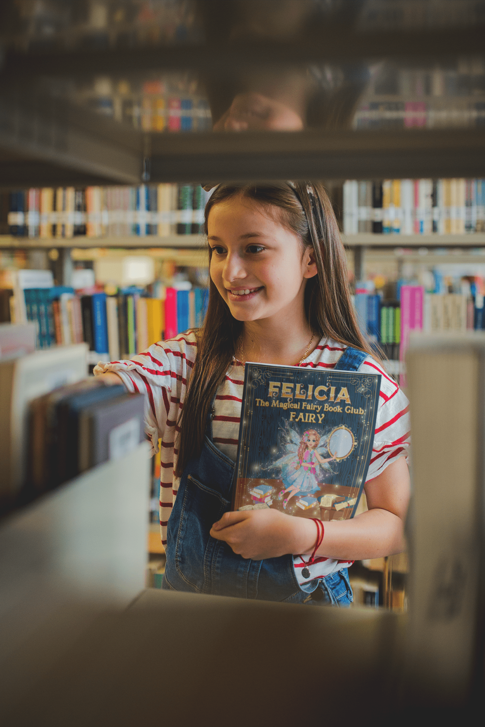 smiling-girl-holding-a-book-template-at-a-library-a19275-min smiling-girl-holding-a-book-template-at-a-library-a19275-min